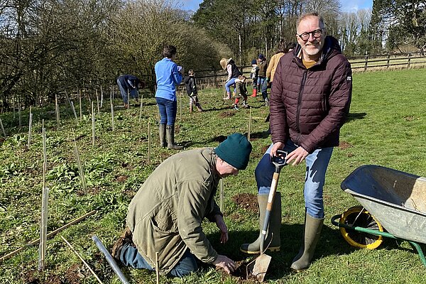 Paul Hodgkinson plants a tree sapling